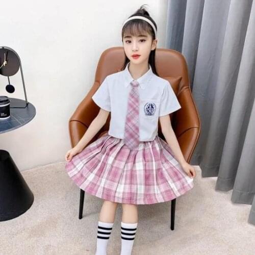 Spring Summer 2021 Fashion Childrens Primary School Girls JK Uniform White Bow Collar Blouse + Plaid Pleated Skirt Clothing Set