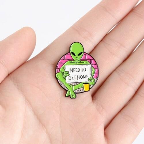 Wandering Green Alien Enamel Brooch holding a sign "NEED TO GET HOME" Creative personality badge Gifts for children