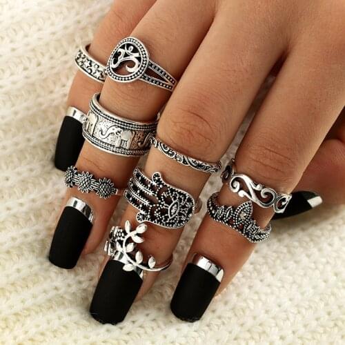9pcs of pack personality creative vintage totem knuckle rings for women with carved flower /animal design female knokkels rings