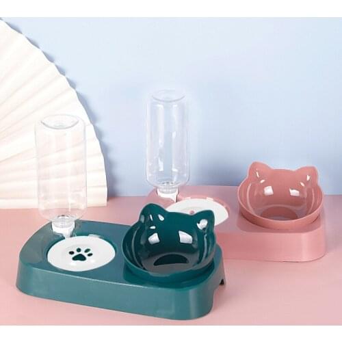 Household wind belt drinking water pot inclined cat bowl cute cat face floating bowl pet automatic water feeder rice bowl feeder