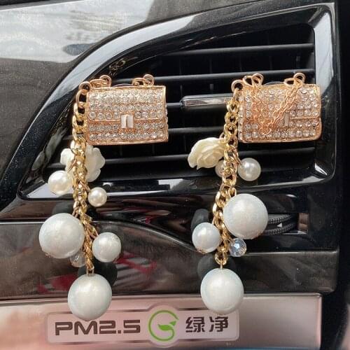 Car air conditioning air outlet perfume clip pearl handbag car aromatherapy car perfume creative high heels car interior