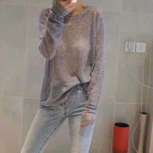 Autumn and winter new ultra thin and micro transparent sweater round neck large base sweater womens loose Korean Short Knitwear