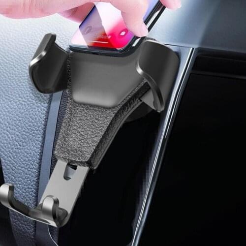 Vehicle-mounted mobile phone mount gravity leather pattern bracket vehicle air outlet navigation vehicle type universal support