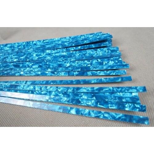 30STRIP LIGHT BLUE PEARL CELLULOID BINDING,SIZE:7mm x 1.5mm thick and1600mm long