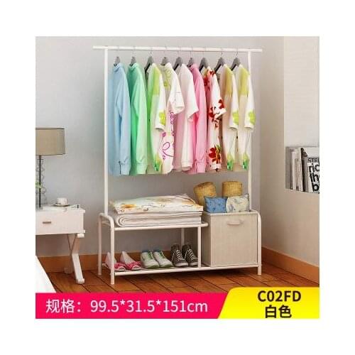 Simple hangers. Floor clothes rack. Shelves for bedroom clothes