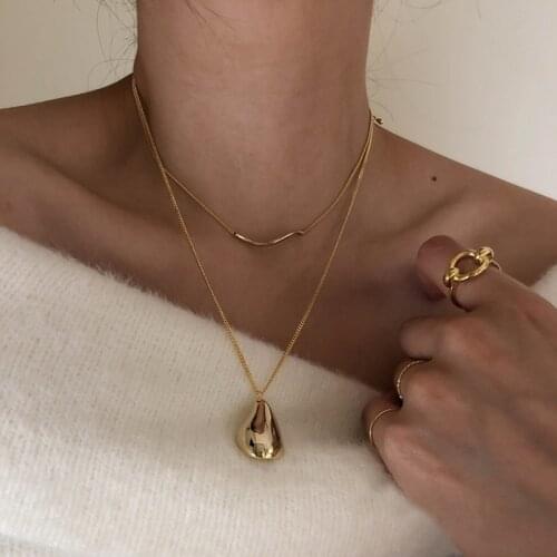 U-Magical Minimalist Irregular Waterdrop Pendant Necklaces Wave Shape Gold Metal Necklaces for Women Geometric Necklace Jewelry