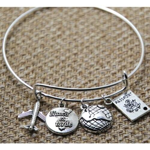 12pcs Spanish bracelet travel-Bracelet with airplane passport world and stamped nunca es tarde or sigue a tu corazon charms