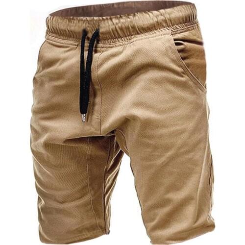 Men Training Shorts Solid Color Pocket Drawstring Sport Shorts Slim Elastic Jogger Pants Shorts Outdoor Fashion Casual Shorts