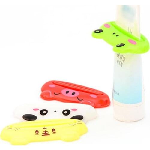 1pc Random Color Cute Bathroom Plastic Tube Toothpaste Dispenser Rolling Easy Squeezer Holder Squeezer Toothpaste Dispenser Tool