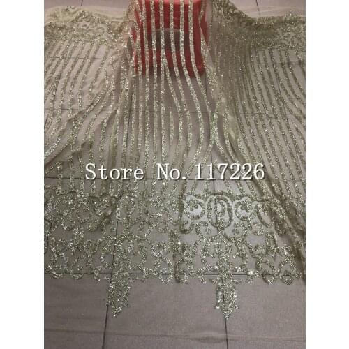 New arriving glued glitter african Tulle lace in gold color for nice dress modern design french glued glitter lace fabric