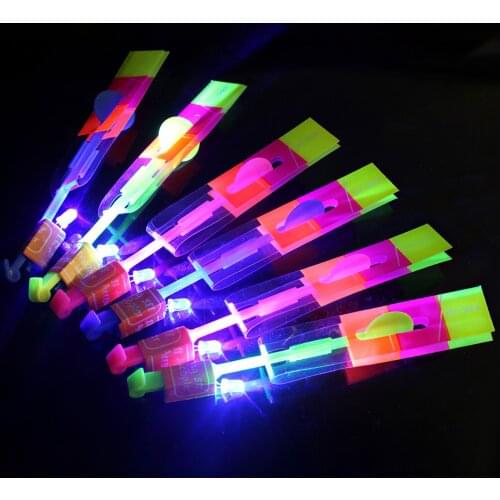 A Set Outdoor Shining Rocket Flash LED Slingshot Elastic Helicopter Rotating Flying Toy Arrow Gift Children Fairy Catapult