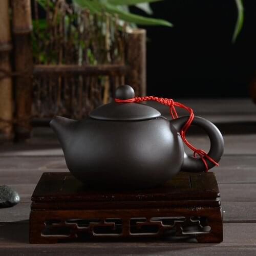 Purple sand teapot Household ceramics kung fu tea set Porcelain tea regimen of a complete set recommended priced direct selling
