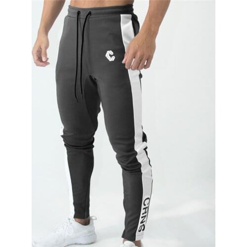 New Men Leisure Joggers Gyms Pants Men streetwear hip hop trousers Mens Tight Sweatpants Brand Gym fitness Sporting Pants