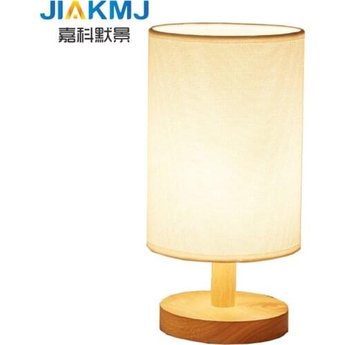 European bedroom bedside eye study modern minimalist fashion creative dimmable solid wood cloth small desk lamp