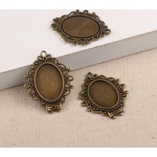 20pcs antique bronze flower pendant settings 18*25mm oval vintage cameo cabochon base diy jewelry necklace blanks
