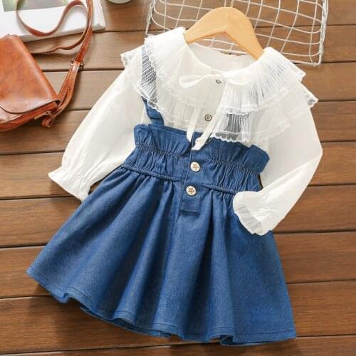 Autumn girl suit new fashion long-sleeved doll collar shirt + cute baby suspender skirt 2-piece childrens clothing