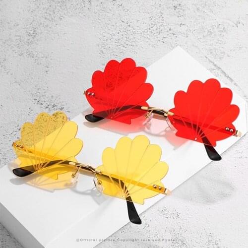 Unique Brand Sunglasses Summer Travel Rimless Sunglasses For Women Sexy Female Ocean Lens Shades Womens Shell Sun Glasses UV400