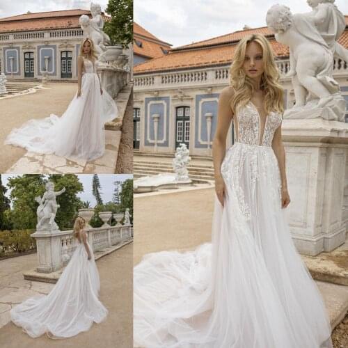2020 Bohemian Wedding Dresses Deep V Neck Lace Appliques Bridal Gowns Sexy Backless Sweep Train A Line Wedding Dress