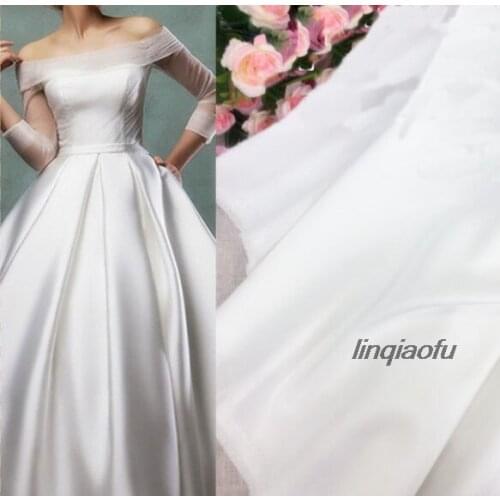 Soft and heavy flash satin fabric pearlescent high-end fashion wedding dress fabric Wedding dress fabric