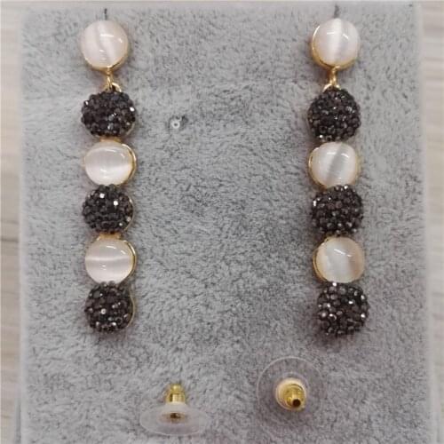 Long strip shape golden metal paved round black and white crystal rhinestone and natural stone charms dangle earring for women