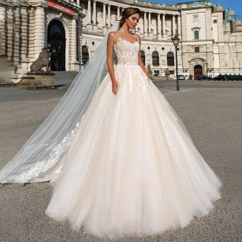 Ashley Carol A-Line Wedding Dress 2021 Charming Strapless Beading Appliques Bride Spaghetti Straps Backless Princess Bridal Gown