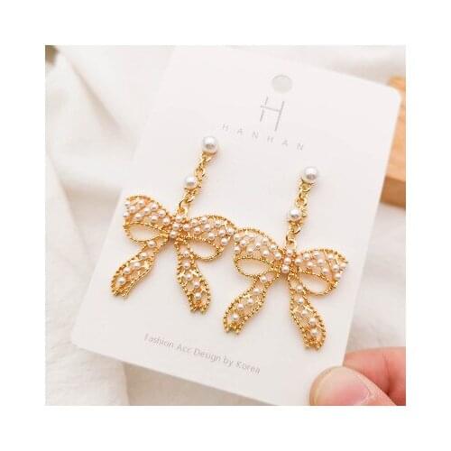 Fashion personality Exaggeration Bow Imitation Pearl Eardrop Elegant For Women Earrings pendientes brincos temperament