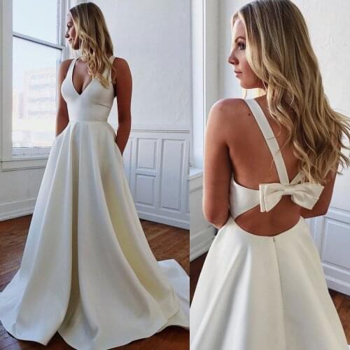 Elegant V Neck Ivory Wedding Dresses with Pockets Open Crisscross Back Satin Simple Zipper 2021 Wedding Gowns With Bow Plus Size
