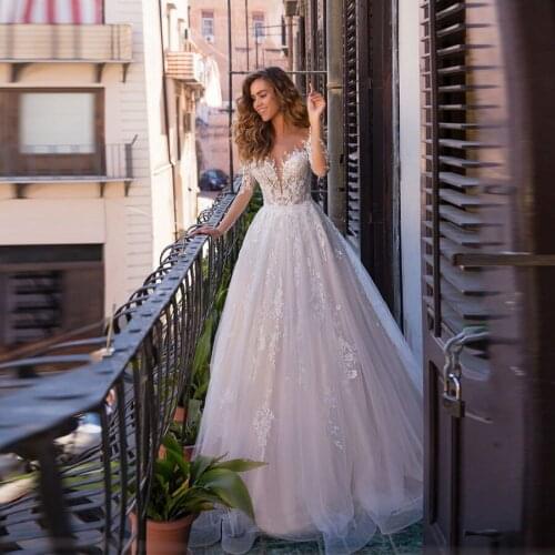 Sheer Back Scoop Neckline Applique Lace Wedding Dress Long Sleeve Sweep Train Tulle A-line Bridal Gowns For Women