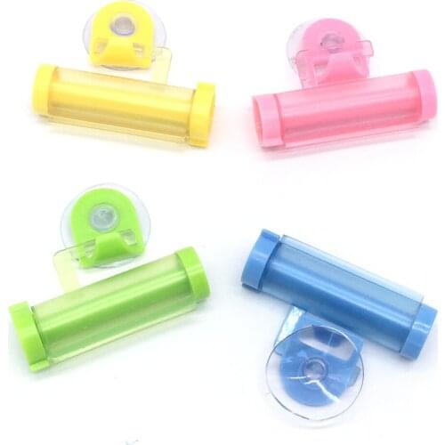 Plastic Rolling Tube Squeezer Toothpaste Dispenser Sucker Holder Dental Cream Bathroom Manual Syringe Gun Dispenser