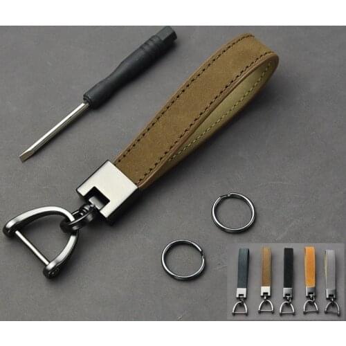 Creative key fobs Mens and womens head leather car key pendant leather key buckle gifts