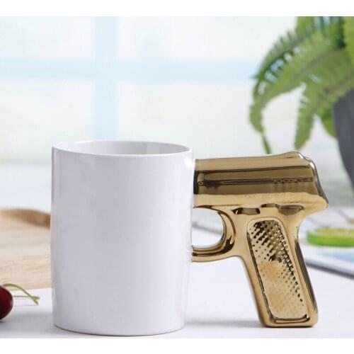 Ceramic cup office Cup creative gold and silver pistol cup gun handle Mug personality water cup coffee cup funny water cup