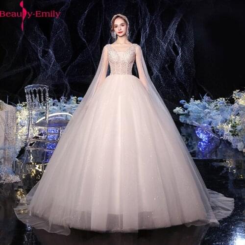Romantic V Neck Lace Sleeveless White Wedding Dress for Women Luxurious Sequined Lace Up Back Hot Sale Wedding Dress 2020