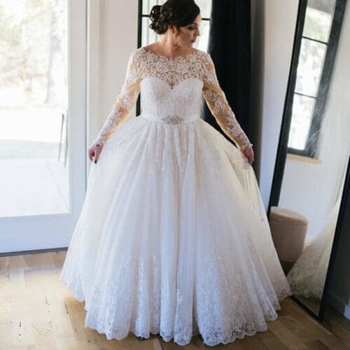 2021 New Gorgeous A Line Lace Long Sleeves Bridal Wedding Dresses Backless Bateau Neckline Wedding Gowns for Bride Beaded Belt