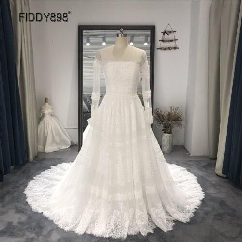 Elegant Beaded Long Sleeves A-Line Lace Wedding Dresses for Women 2021 Pearls Bride Wedding Gown Beach Bridal Dress