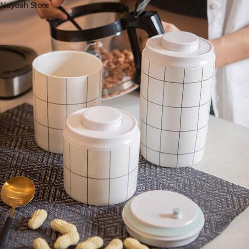 Creative Fresh-keeping Vacuum Ceramic Storage Tank 700ml Large Capacity Tea Caddy One-touch Storage Box Coffee Bean Storage Tank