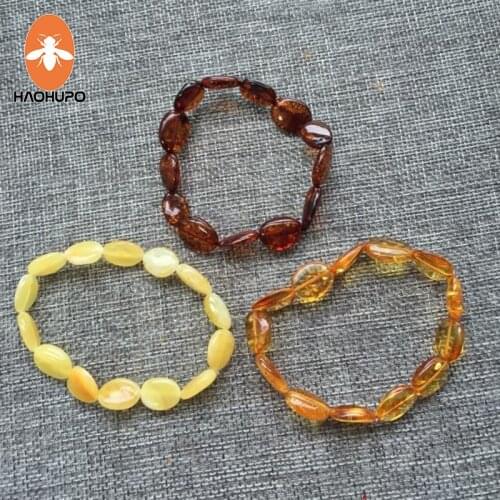 HAOHUPO Handmade 100% Natural Oval Shape Amber Jewelry Olive Style Baltic Polished Amber Bracelet for Women Elastic Jewelry Bead