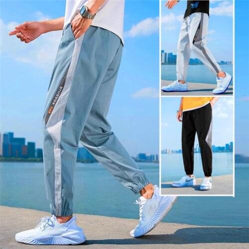 Hip Hop Style Men Jogging Pants Spring Summer Fashion Trendy Loose Sport Pants Elastic Waist Male Outdoor Baggy Trousers 2021