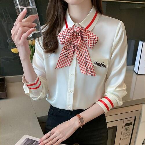 Fashion shirt women 2021 spring new temperament net red design sense niche bow ribbon ribbon long-sleeved top women