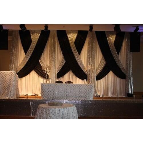 Pure White Wedding Backdrop with black swags