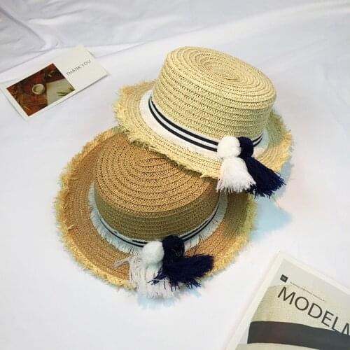 2017 Unique Design Straw Hats Korea Flat Top Straw Boater Hats for Summer Women Men Wide Brim Beach Sun Hats with Tassels