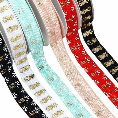5/8" gold foil pineapple printed FOE fold over elastic 100yards