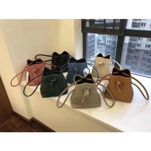 Niche design womens bucket bag head layer cowhide simple draw rope one-shoulder slant bag
