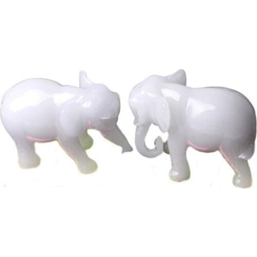 A PAIR OF ELEPHANT ORNAMENTS RESIN ELEPHANT FURNISHINGS KAIGUANG FORTUNE HOUSEHOLD JADE WHITE JADE WATER CRAFTS DECORATION