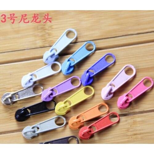 Free shipping 100pcs/lot 3# nylon zipper head high-grade metal zipper head pull piece