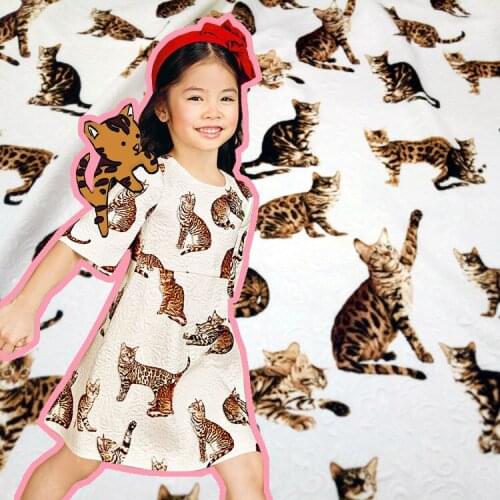 Fashion show pattern Autumn thick jacquard fabric cat pattern childrens clothing printing jacquard cloth red and white