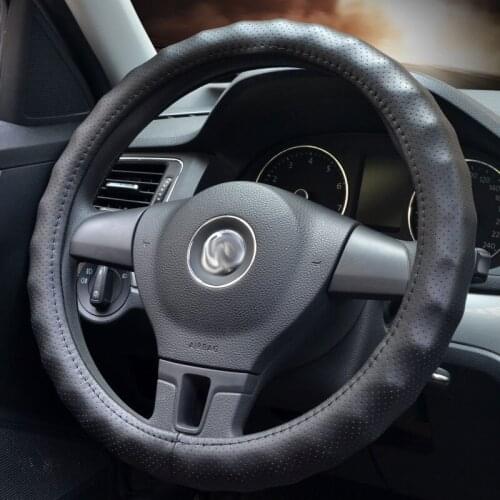 Car leather steering wheel cover four seasons set of breathable full punching one interface full circle bump