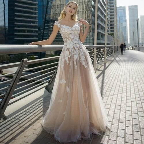 Sheer O-neck 3D Flowers Wedding Dresses Elegant Champagne Tulle A Line Buttons Back Floor Length Bridal Gowns Vestido Noiva 2021