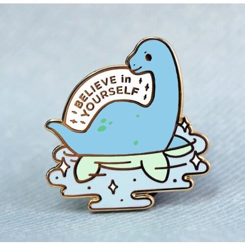 Believe In Yourself Funny Loch Ness Monster Hard Enamel Pin Cute Cartoon Dinosaur Swim Medal Brooch Fashion Lapel Backpack Pin