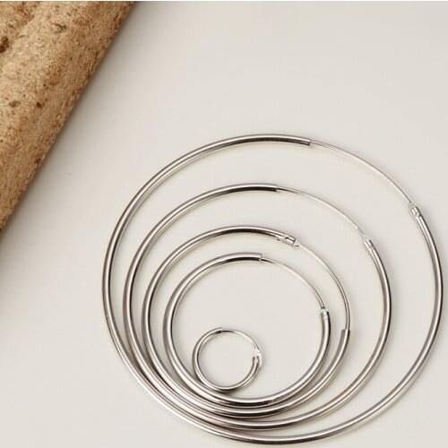 Korean version of S925 sterling silver earrings minimalist fashion wild ear bone nail circle earrings men and women ears hypoall