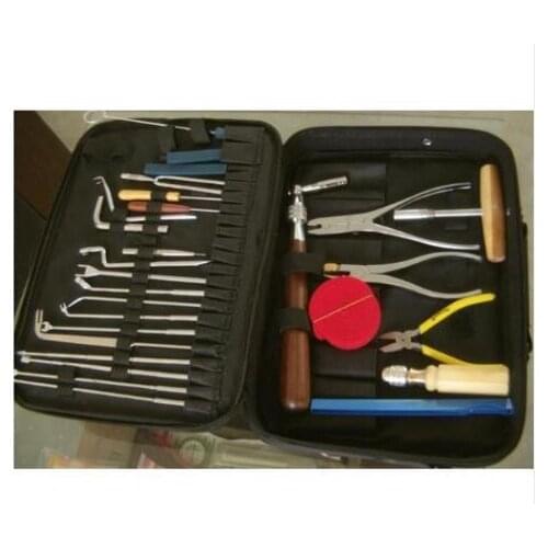 The piano tuning tool The piano accessories 28 sets tools With red wooden hand